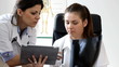 Consultation X-ray results with tablet in doc office