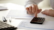 female accountant making fast calculations