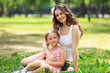 Mother and daughter in the park