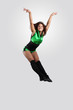 Young female dancer against white background