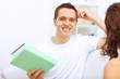 Photo: Young happy couple at hone together s Young happy couple at hone together s