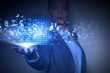 Photo: Business woman with financial symbols around Business woman with financial symbols around