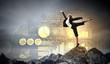 Photo: businesswoman standing atop of mountain businesswoman standing atop of mountain