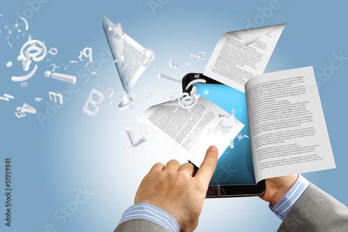 Photo: e book reader and books e book reader and books
