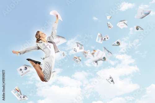 Photo: Image of jumping businesswoman Image of jumping businesswoman