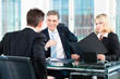 Business - young man sitting in job Interview