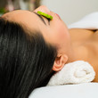 Photo: Asian woman getting a facial treatment in spa Asian woman getting a facial treatment in spa