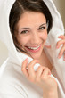 Photo: Cheerful smiling woman in white bathrobe Cheerful smiling woman in white bathrobe