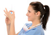 Photo: Woman nurse with syringe in blue uniform Woman nurse with syringe in blue uniform
