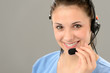 Photo: Friendly support phone operator wearing headset Friendly support phone operator wearing headset
