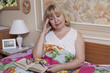 Old woman suffering with fever in the bedroom