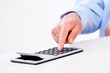 Hand with calculator.
