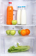 Open refrigerator with vegetarian (diet) food