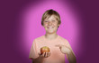 Photo: Preteen with a red apple Preteen with a red apple