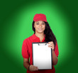 Young worker with red uniform and clipboard