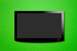 Black LCD tv screen hanging on a wall