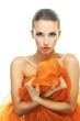 Photo: Young woman with orange shawl Young woman with orange shawl