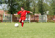 Little Boy playing soccer