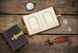 antique photo album over grungy wooden background