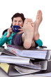 Office woman puts feet up relaxing