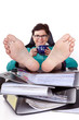 Office woman puts feet up relaxing