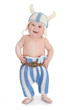 Little viking in handmade knitted costume.