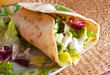 Chicken and vegetables wrapped in tortilla