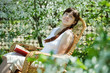 Girl  in bloom garden