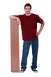 Young man with floorboards