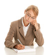 Young businesswoman behind desk