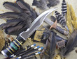 Hunting background with feathers and arrows