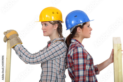Photo: Two female carpenters Two female carpenters