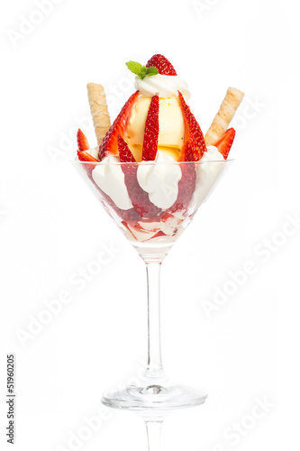 Photo: sundae with vanilla ice cream and strawberries sundae with vanilla ice cream and strawberries