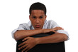 Foto: Businessman sat backwards on hair Businessman sat backwards on hair