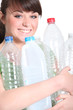 Brunette recycling plastic bottles