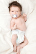 Photo: Cute baby boy with dark hair. Cute baby boy with dark hair.
