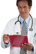 Photo: Doctor smiling with clipboard Doctor smiling with clipboard