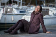 assise sur le ponton