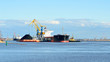 cargo ship loading in coal cargo terminal
