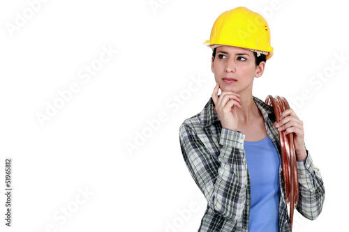 Photo: craftswoman thinking craftswoman thinking