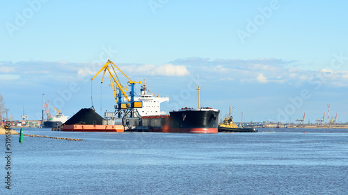 Photo: cargo ship loading in coal cargo terminal cargo ship loading in coal cargo terminal