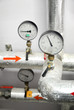 thermometers on industrial water pipeline