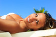 Pretty young woman relaxed by the pool