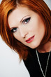 Golden Fashion Girl Portrait. Red Hair.