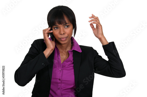 Photo: Annoyed businesswoman on the phone Annoyed businesswoman on the phone