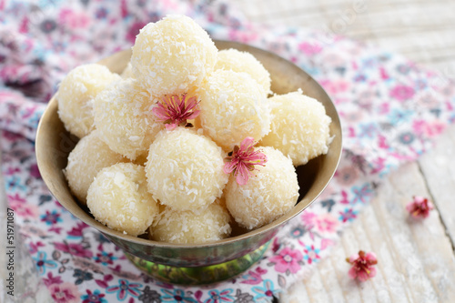 Photo: Homemade coconut bites in metal bowl Homemade coconut bites in metal bowl