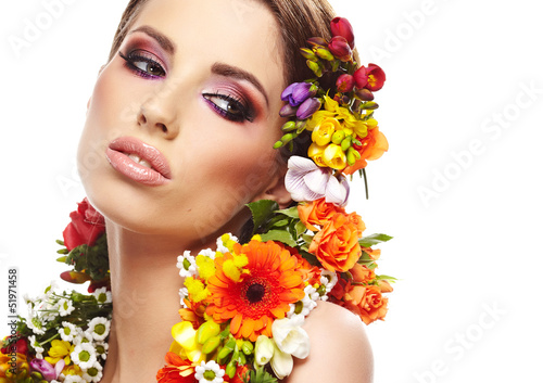 Photo: Beautiful woman with flower wreath. Space for text. Beautiful woman with flower wreath. Space for text.