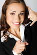 Businesswoman with call me gesture, over gray
