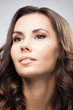 Portrait of beautiful woman, over grey
