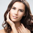 Portrait of beautiful woman, over grey
